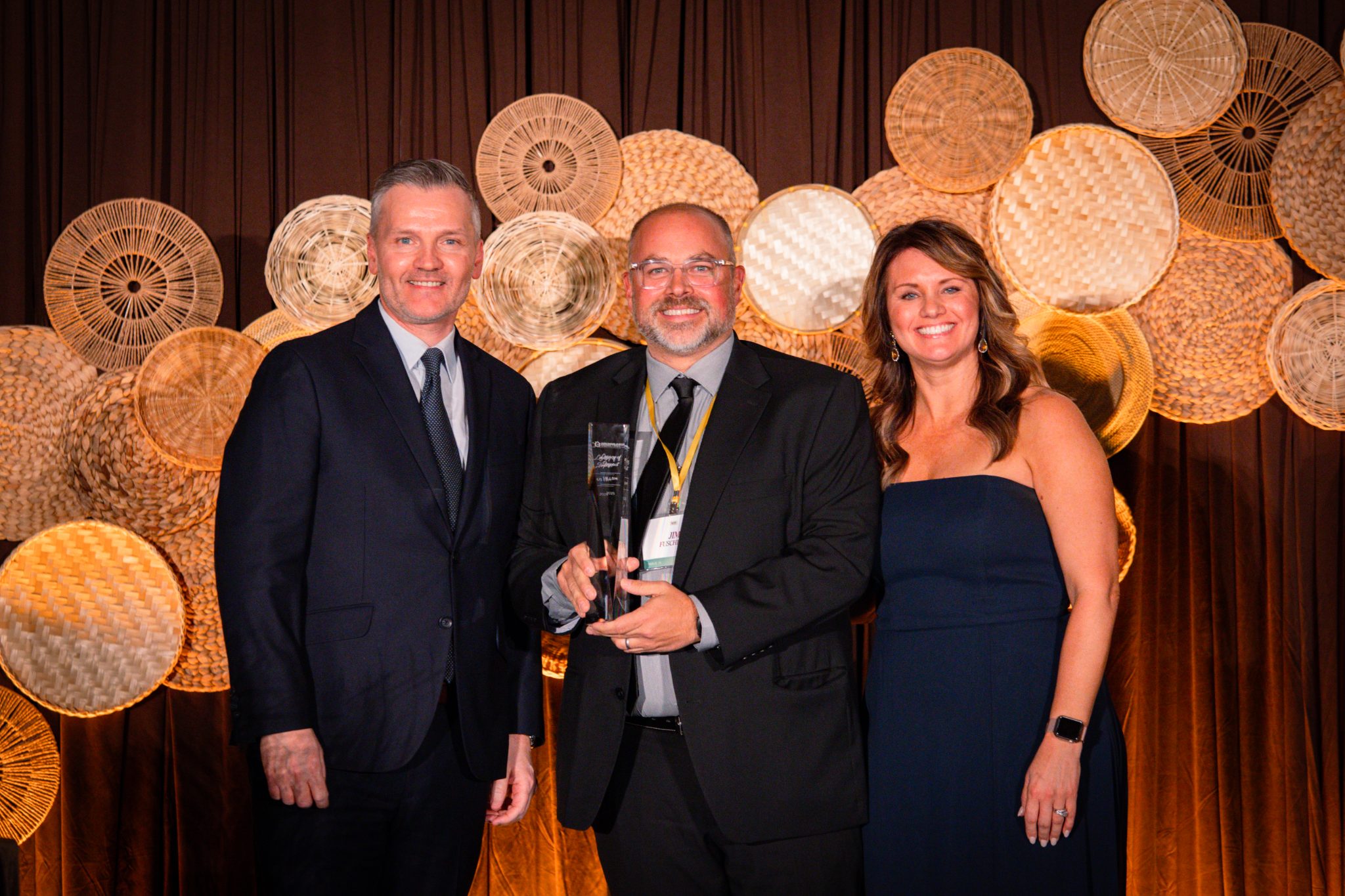 Celebrating a Legacy of Impact 4 Jim Fuschetto accepts the Legacy of Impact Award on behalf of US LBM at the Housing First Minnesota Foundation gala